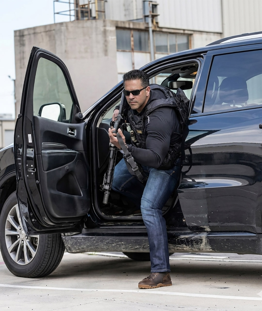 Guardion Protection security guard monitoring restricted area and perimeter fencing.